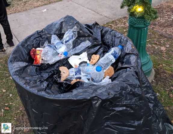 Holiday Hustle 2018 - Trash on top of covered bin