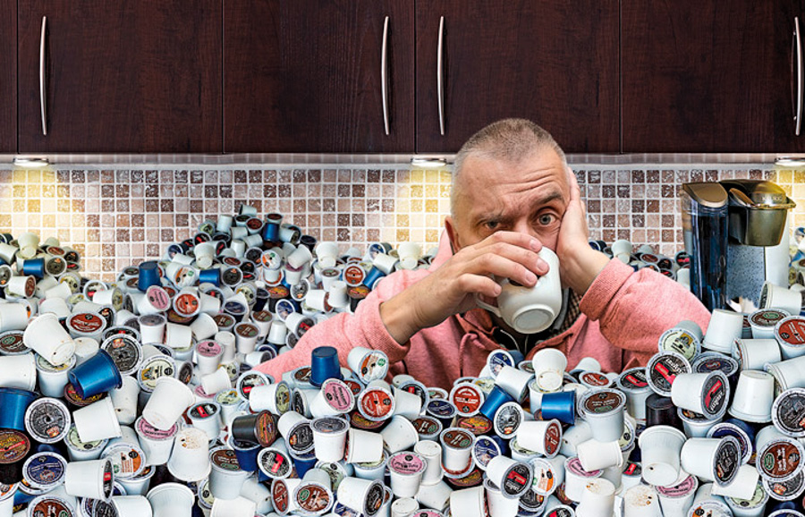 Photo of coffee drinker buried in K-Cups