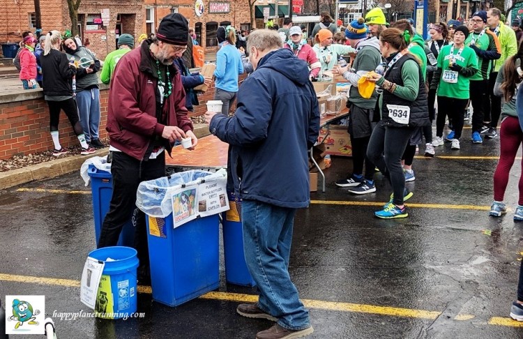 Shamrocks and Shenanigans 2019 - Scott helps person at station