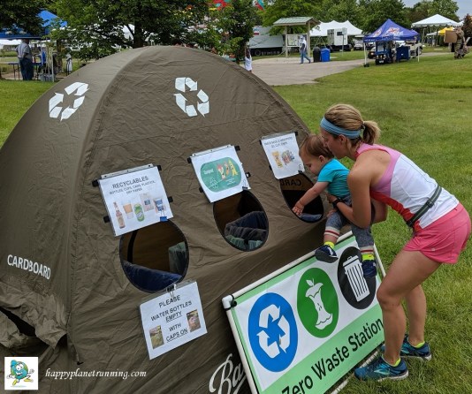 Canton Liberty Run 2019 - Mom helps toddler recycle