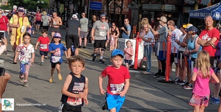 Firecracker 5K 2019 - Kids with Larry in background