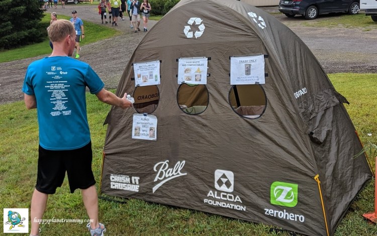 Vines 2019 - Runner looking at tent signage
