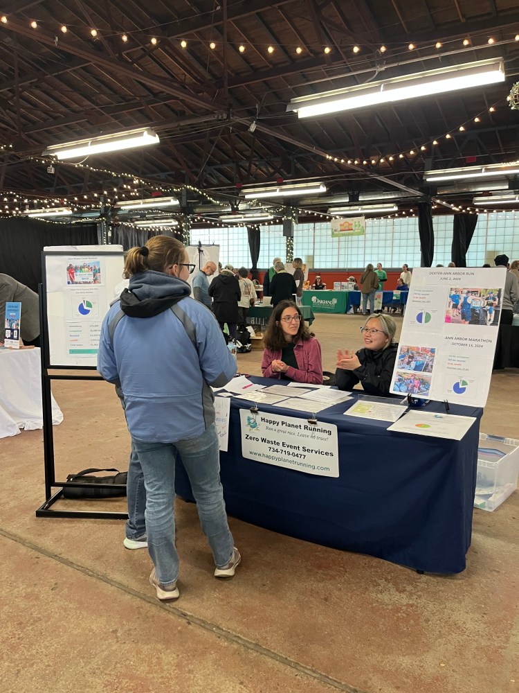 Liz and Sara at HPR table at Earth Day Fair